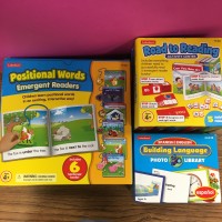 Positional Words for emergent readers, Road to Reading activity center, and Spanish/English photo library